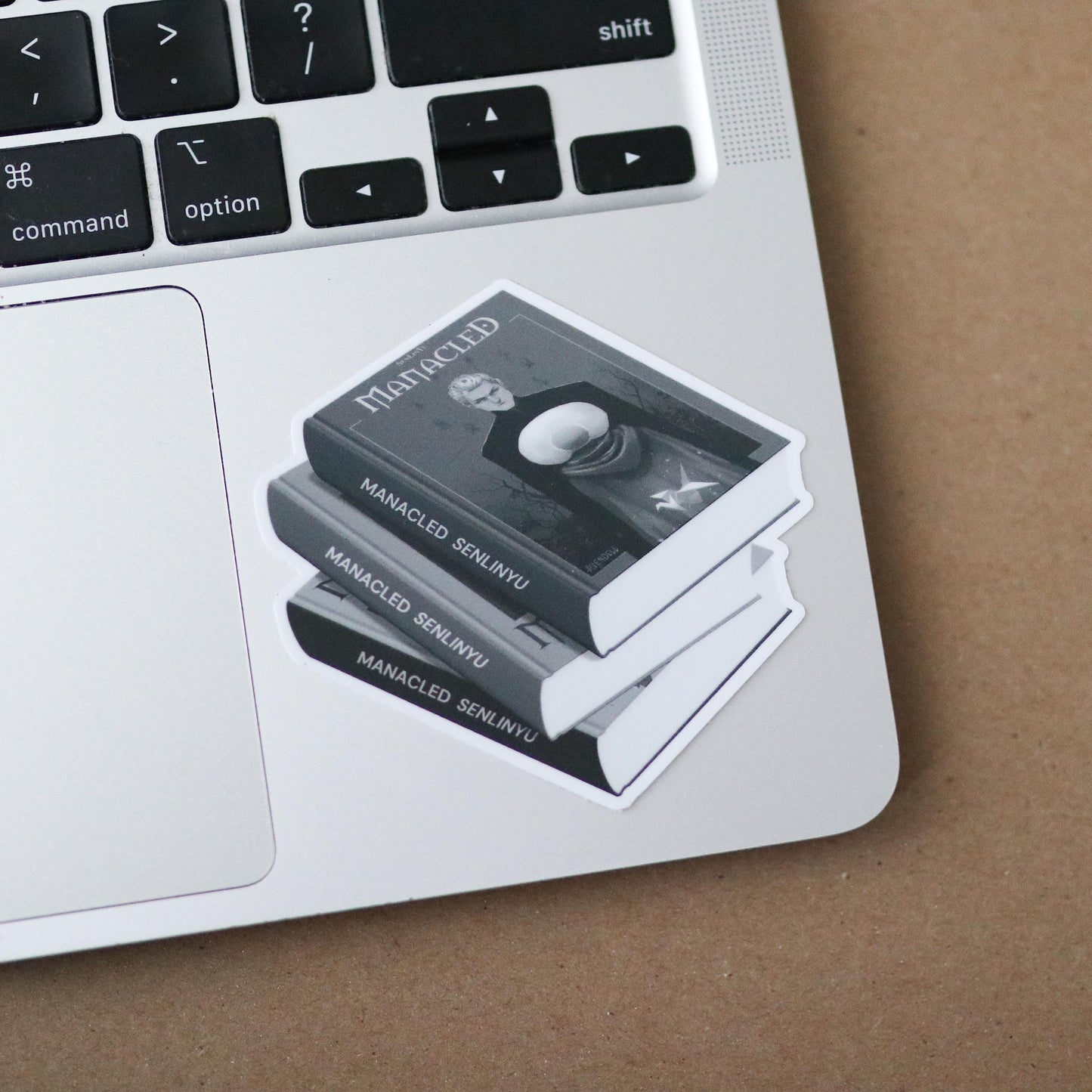 Manacled Book Stack Sticker